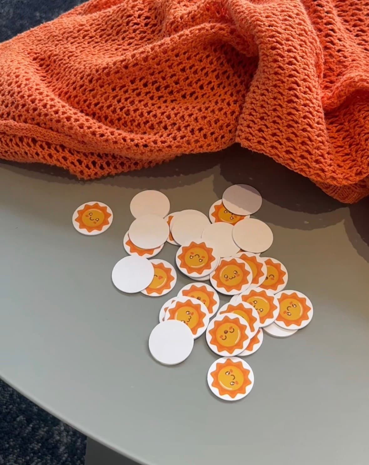 Sunny NFC tag stickers, printed with a smiling sun design